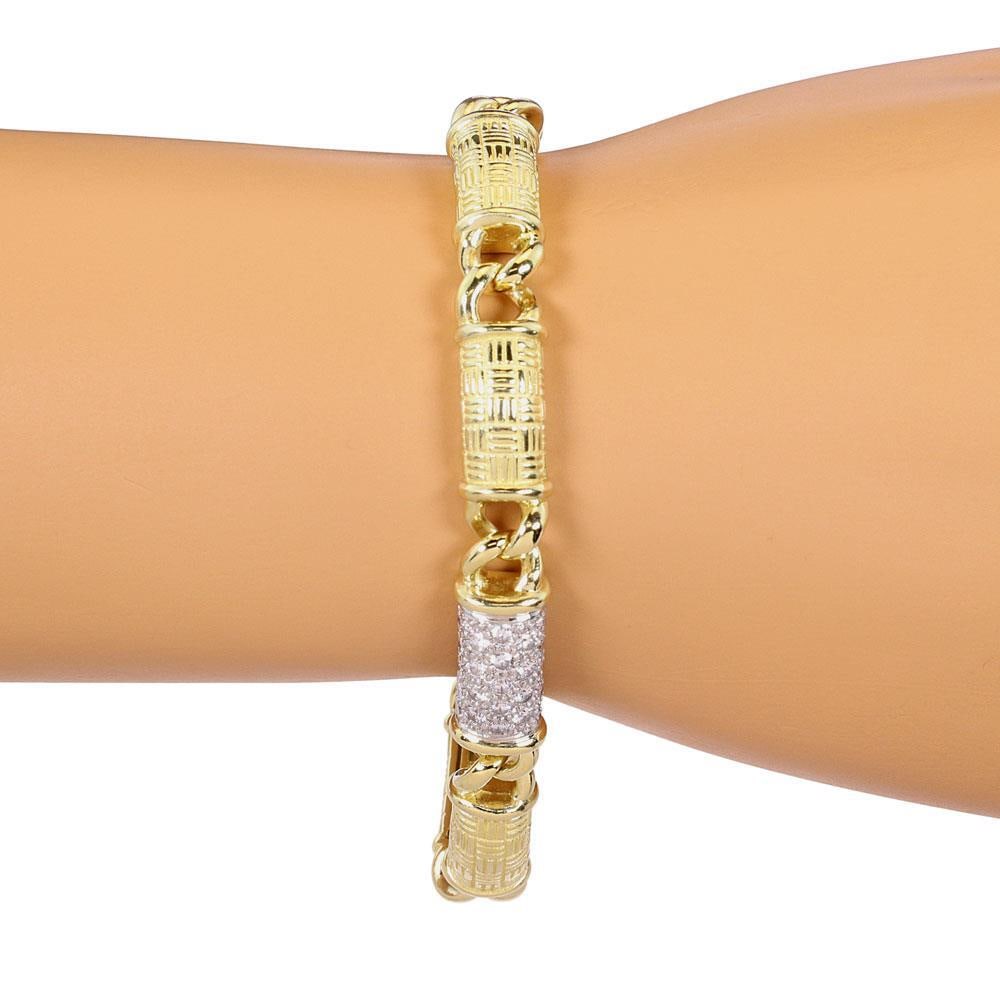 18k Yellow Gold Platinum 1ct Diamond Curved Bar Bracelet: 18k Yellow Gold Platinum 1ct Diamond Curved Bar Bracelet This stunning bracelet features a unique combination of 18k yellow gold and platinum, designed with a textured finish. It showcases eight elega