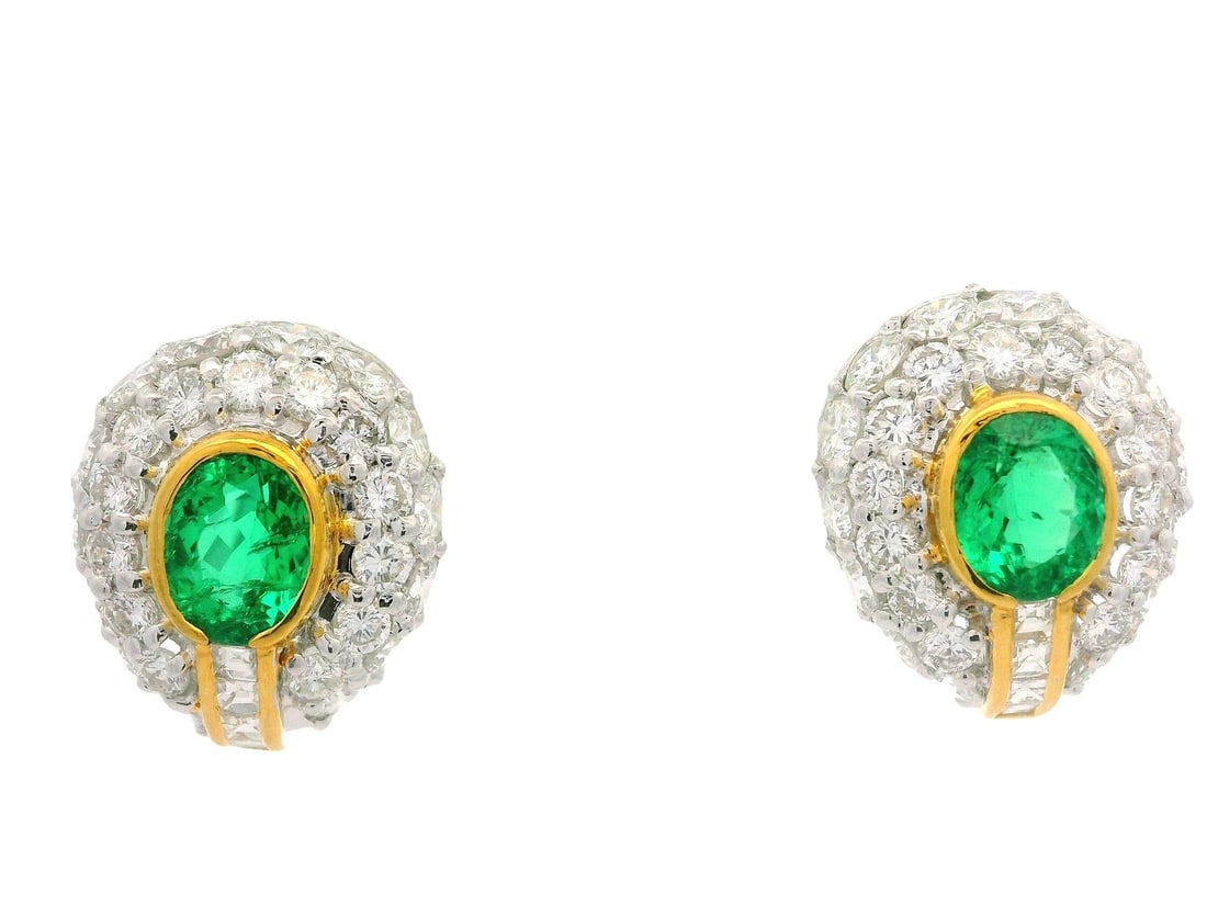 GIA Certified 7.52ctw Colombian Emerald Diamond Clip-On Earrings: GIA Certified 7.52ctw Colombian Emerald Diamond Clip-On Earrings Exquisite solid gold clip-on earrings featuring stunning Colombian emeralds and dazzling diamonds. Each earring is adorned with two ova