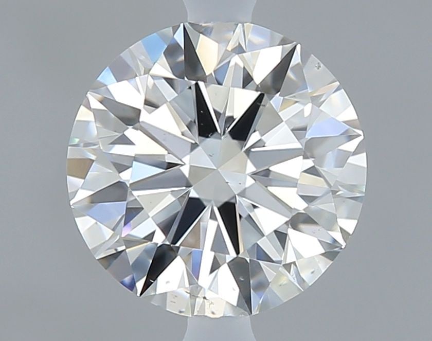 Loose Diamond - ROUND 0.71ct F VS2: Loose Diamond - ROUND 0.71ct F VS2 Source: Natural Shape: ROUND Carats: 0.71 Color: F Clarity: VS2 Certification: IGI Video: