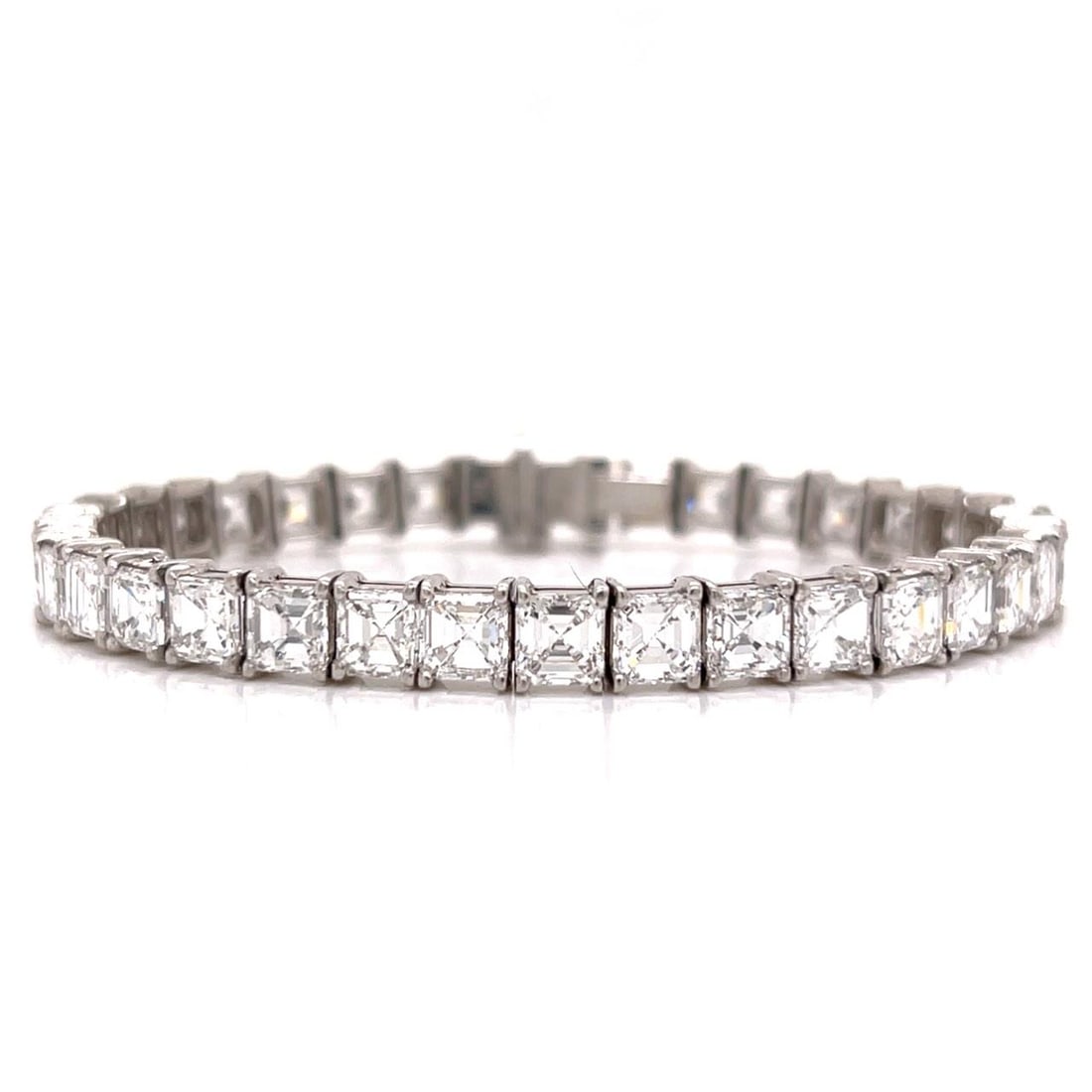 Platinum Diamond Bracelet with 24.50 Carats Ascher Cut Stones Art Deco Era: Platinum Diamond Bracelet with 24.50 Carats Ascher Cut Stones Art Deco Era This Art Deco bracelet showcases 35 Ascher-cut diamonds with an approximate total weight of 24.50 carats, featuring F-G color