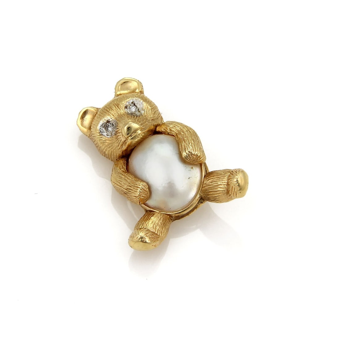 Vintage 14k Yellow Gold Bear Brooch with Diamond and Mabe Pearl Accent: Vintage 14k Yellow Gold Bear Brooch with Diamond and Mabe Pearl Accent This vintage bear-shaped brooch is crafted from 14k yellow gold and features a Mabe pearl accent. The brooch is further embellish