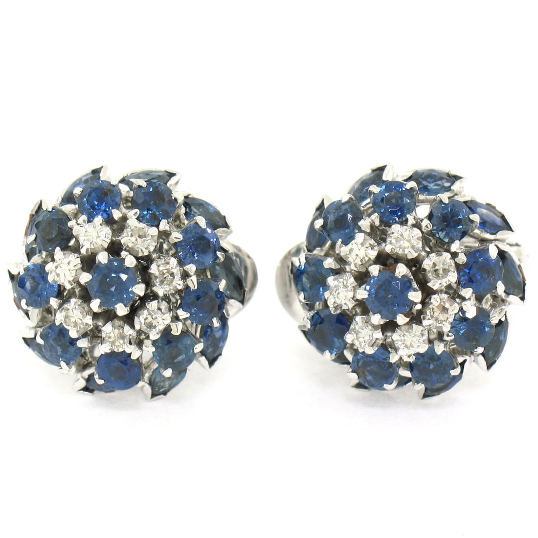 Stunning Silver Palladium Sapphire Diamond Cluster Earrings: Stunning Silver Palladium Sapphire Diamond Cluster Earrings Elevate your elegance with these stunning cluster earrings crafted from sterling silver and palladium. Featuring a captivating tiered design