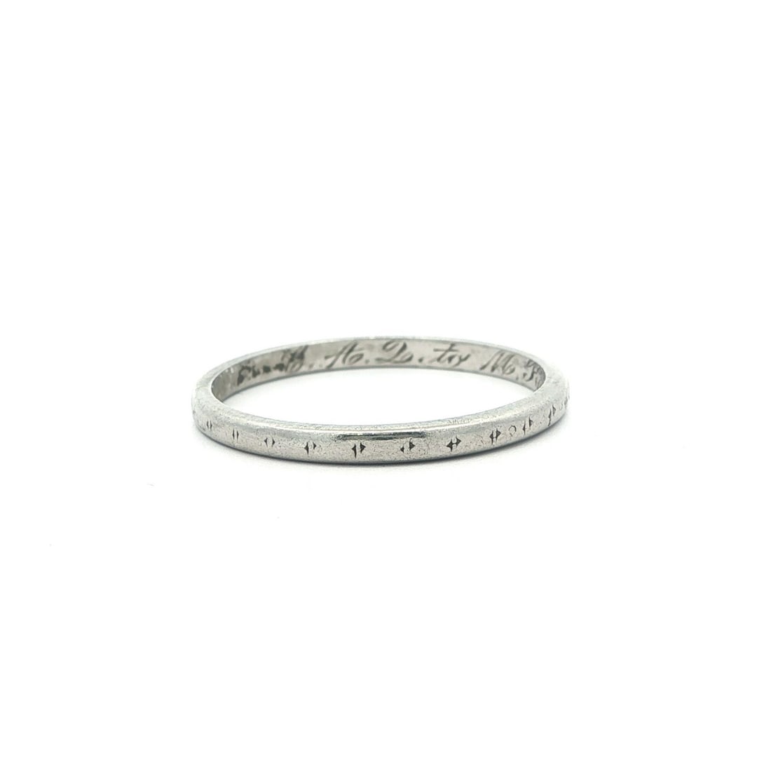 Platinum Antique 1.6mm Engraved Band Ring Size 5: Platinum Antique 1.6mm Engraved Band Ring Size 5 This antique stack wedding band ring is crafted from solid .900+ platinum and features an engraved design with the engraving completely worn out. The b