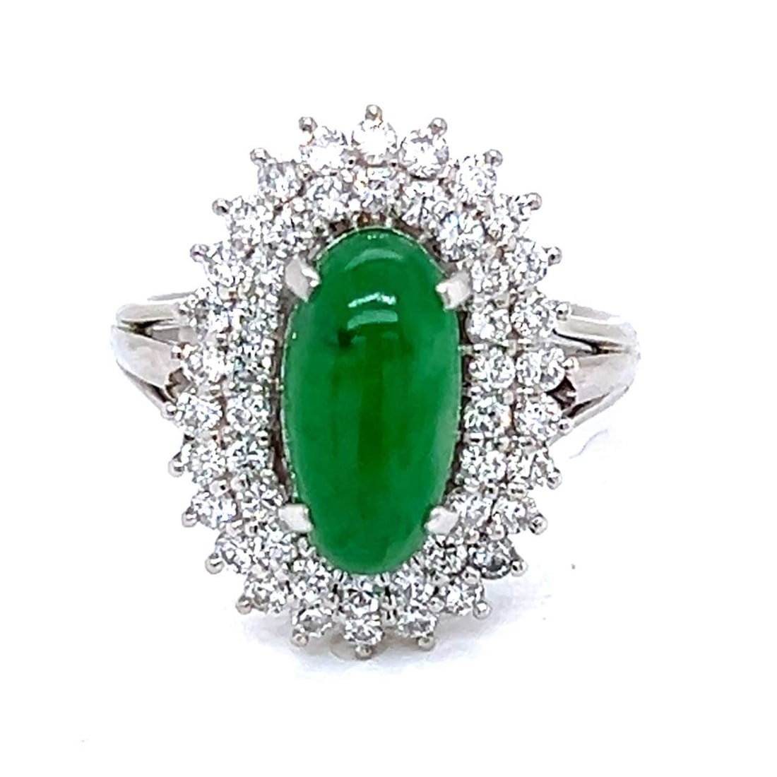 Platinum GIA Certified 3.13 Ct Jade and 48 Diamond Ring: Platinum GIA Certified 3.13 Ct Jade and 48 Diamond Ring This stunning platinum ring features a 3.13 Ct. GIA certified jade center stone, elegantly surrounded by 48 sparkling diamonds. The diamonds hav