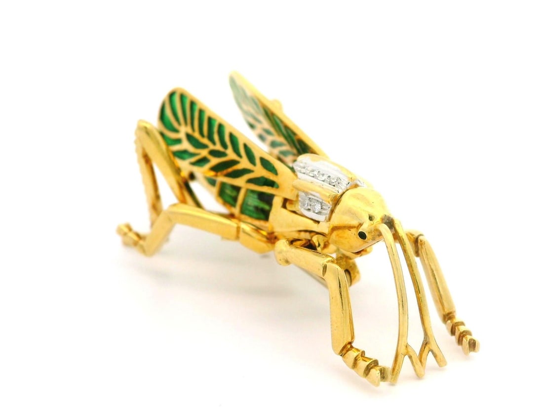 Vintage 18k Yellow Gold Grasshopper Brooch with Diamonds and Enamel: Vintage 18k Yellow Gold Grasshopper Brooch with Diamonds and Enamel This exquisite Vintage Grasshopper Brooch showcases a stunning combination of 18k yellow gold, natural diamonds, and intricate green