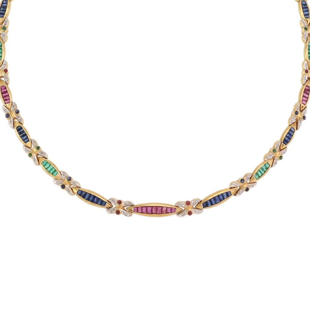 18k Gold Multicolor Gem Necklace with Diamonds and Floral Links: 18k Gold Multicolor Gem Necklace with Diamonds and Floral Links This exquisite necklace showcases a stunning design crafted from 18k yellow gold, accented with white gold. It features elegantly arrang