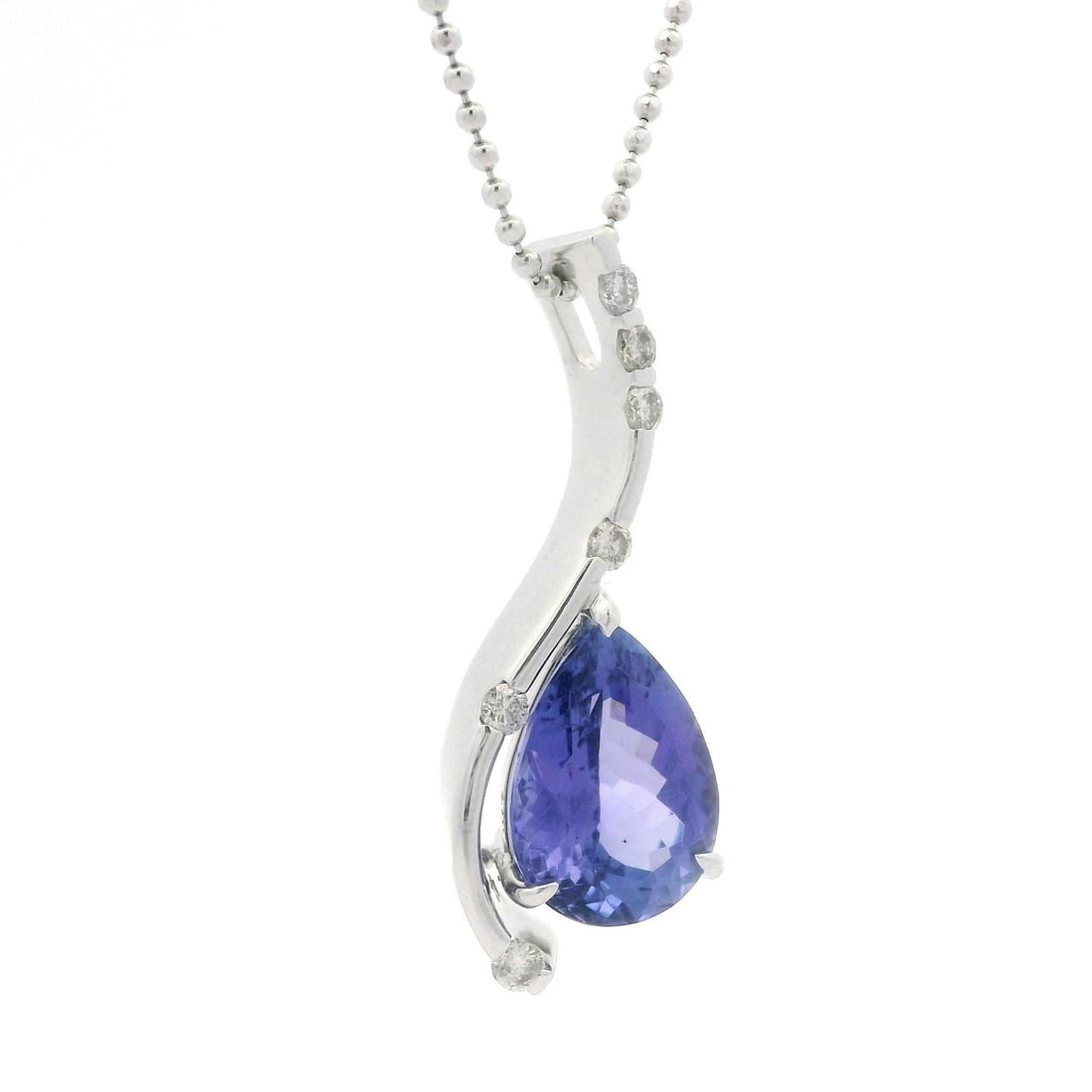 Platinum 4.33ct Tanzanite Diamond Tear Drop Pendant Necklace: Platinum 4.33ct Tanzanite Diamond Tear Drop Pendant Necklace This exquisite necklace features a stunning tear drop pendant crafted from solid platinum, showcasing a natural genuine tanzanite stone in