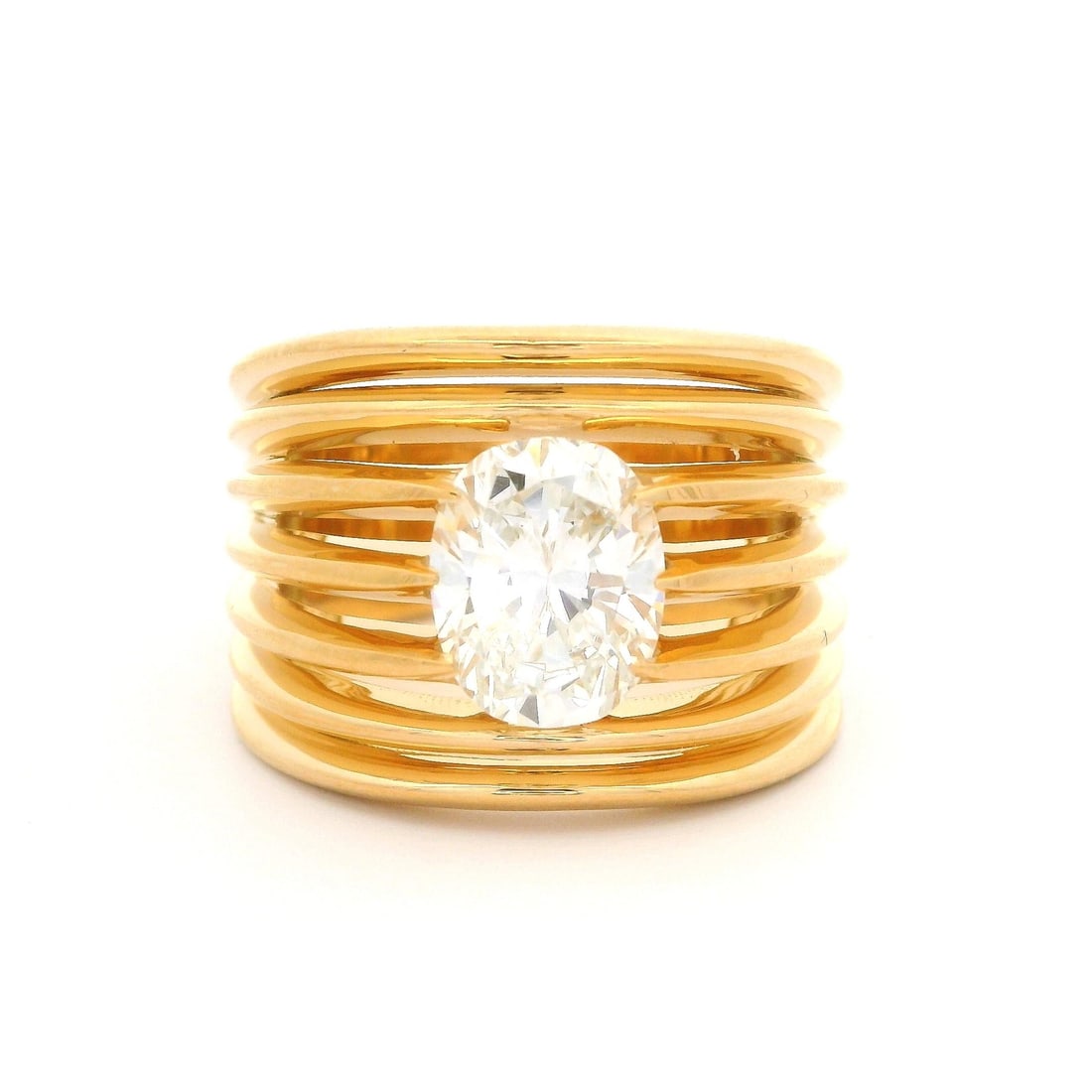 18k Yellow Gold GIA Certified 2.03ct Oval Diamond Ring: 18k Yellow Gold GIA Certified 2.03ct Oval Diamond Ring This stunning wide open work ring features a 2.03 carat oval brilliant diamond, expertly prong set in solid 18k yellow gold. The diamond boasts a