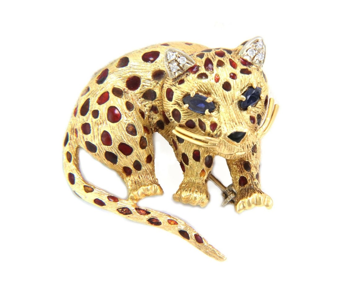 Estate 18k Gold Baby Cheetah Brooch with Sapphire Eyes and Red Enamel: Estate 18k Gold Baby Cheetah Brooch with Sapphire Eyes and Red Enamel This charming Estate brooch is meticulously crafted from 18k yellow gold, featuring a delightful 3D design of a baby cheetah. The