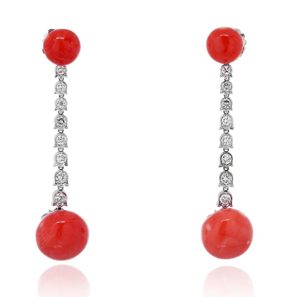 Estate Platinum Coral Diamond Drop Earrings 1.60cttw: Estate Platinum Coral Diamond Drop Earrings 1.60cttw Elevate your elegance with these stunning Platinum Coral Diamond Drop Earrings. Expertly crafted, these earrings feature a captivating design where