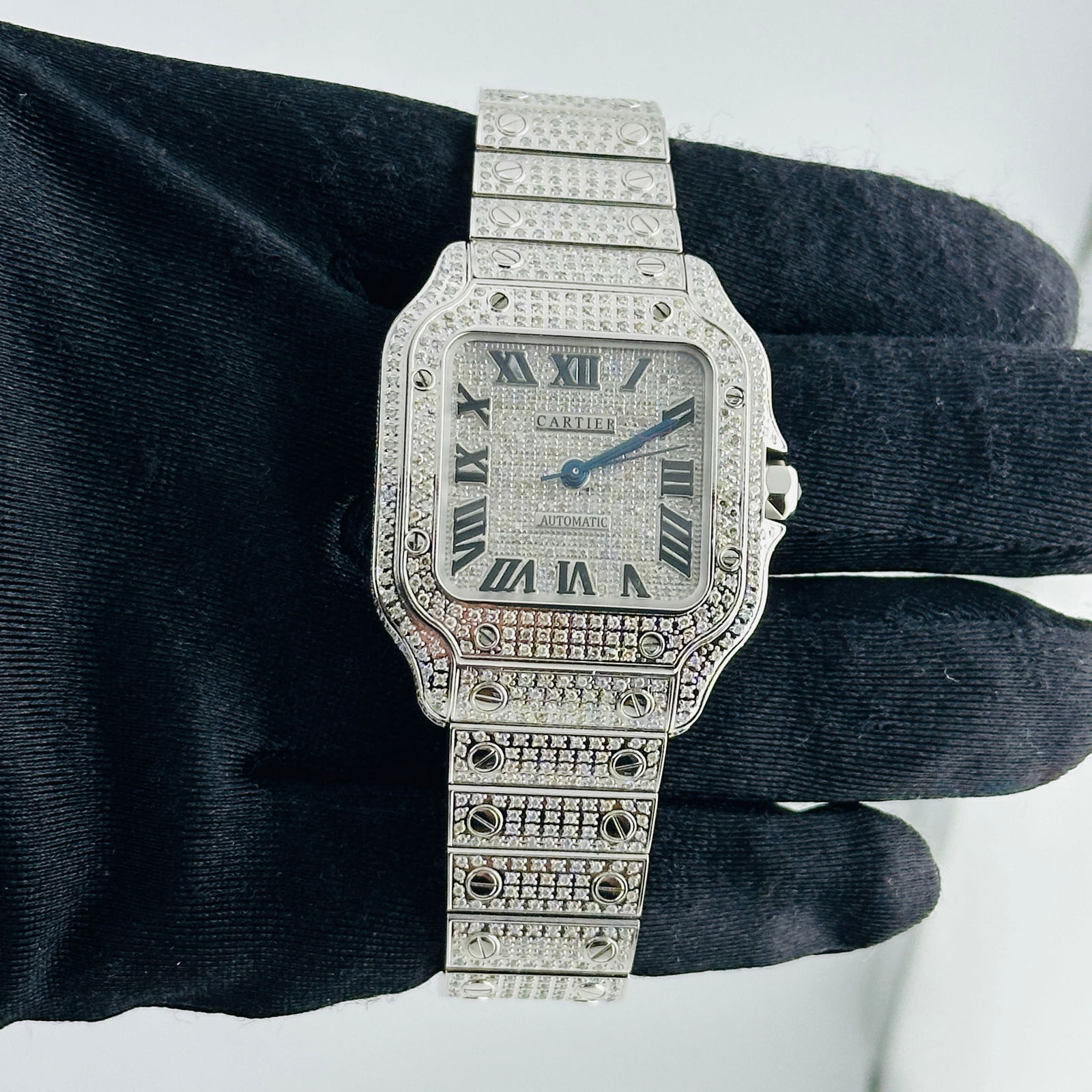 Santos Medium Ref 4075 Unisex Watch with Diamond Roman Dial and Bracelet: Santos Medium Ref 4075 Unisex Watch with Diamond Roman Dial and Bracelet This Cartier Santos Medium watch features a diamond Roman dial, a diamond-set bezel, and a diamond bracelet. Designed for unise