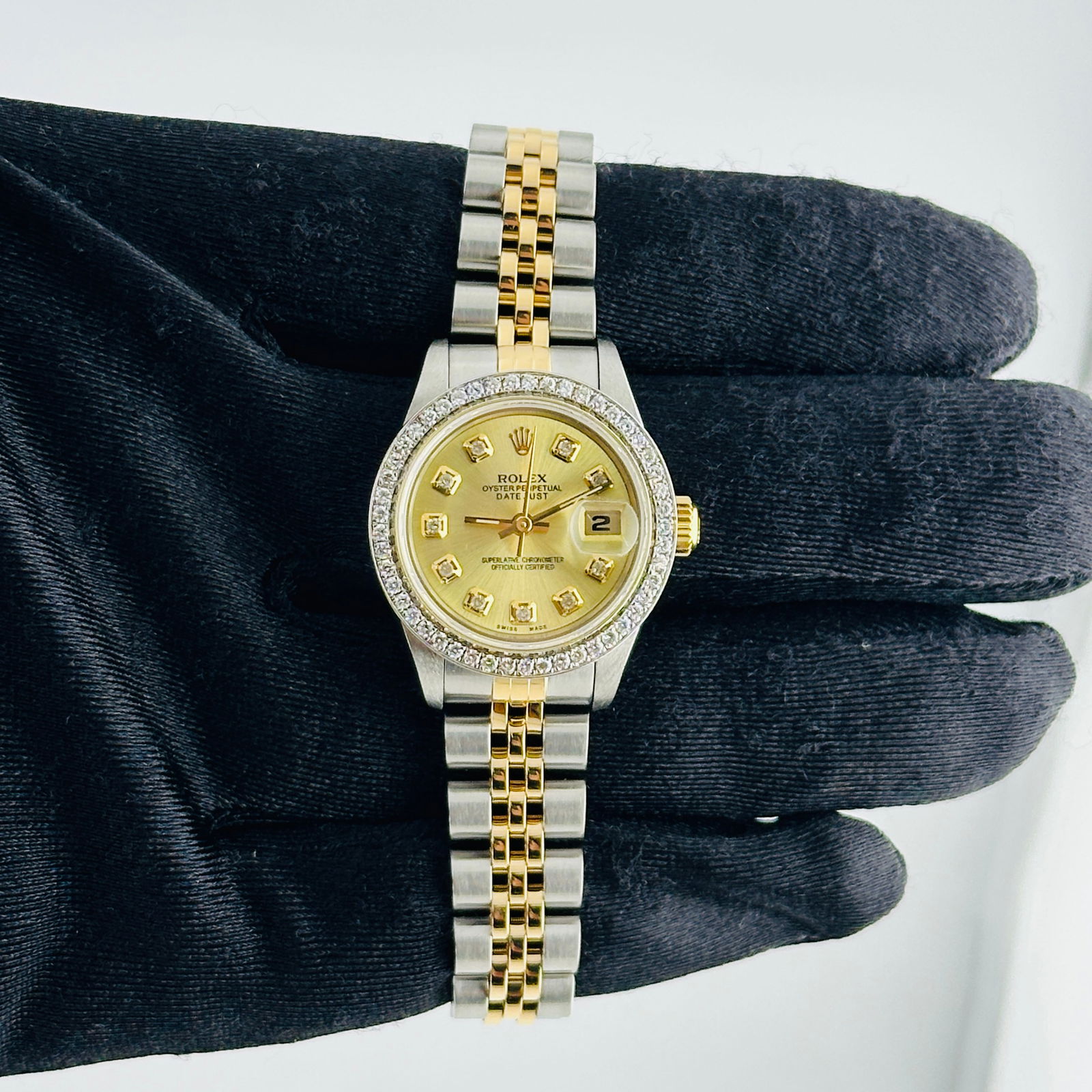 Aftermarket Gold Diamond Dial Datejust Ref 69173 D Link Jubilee Ladies Watch: Aftermarket Gold Diamond Dial Datejust Ref 69173 D Link Jubilee Ladies Watch This ladies' Rolex Datejust watch features an aftermarket gold diamond dial and a D-Link Jubilee bracelet. The reference nu