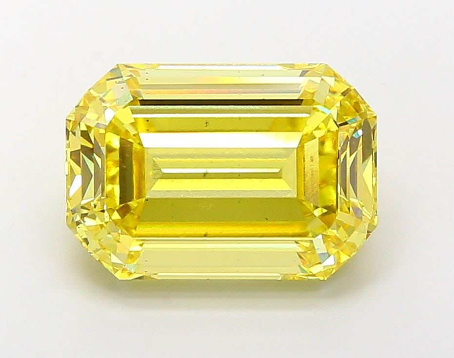 Loose Diamond - EMERALD 9.89ct Fancy Vivid Yellow VS2: Loose Diamond - EMERALD 9.89ct Fancy Vivid Yellow VS2 Source: This is a real non-mined Diamond that has been grown in a lab Shape: EMERALD Carats: 9.89 Color: Fancy Vivid Yellow Certification: IGI Vid