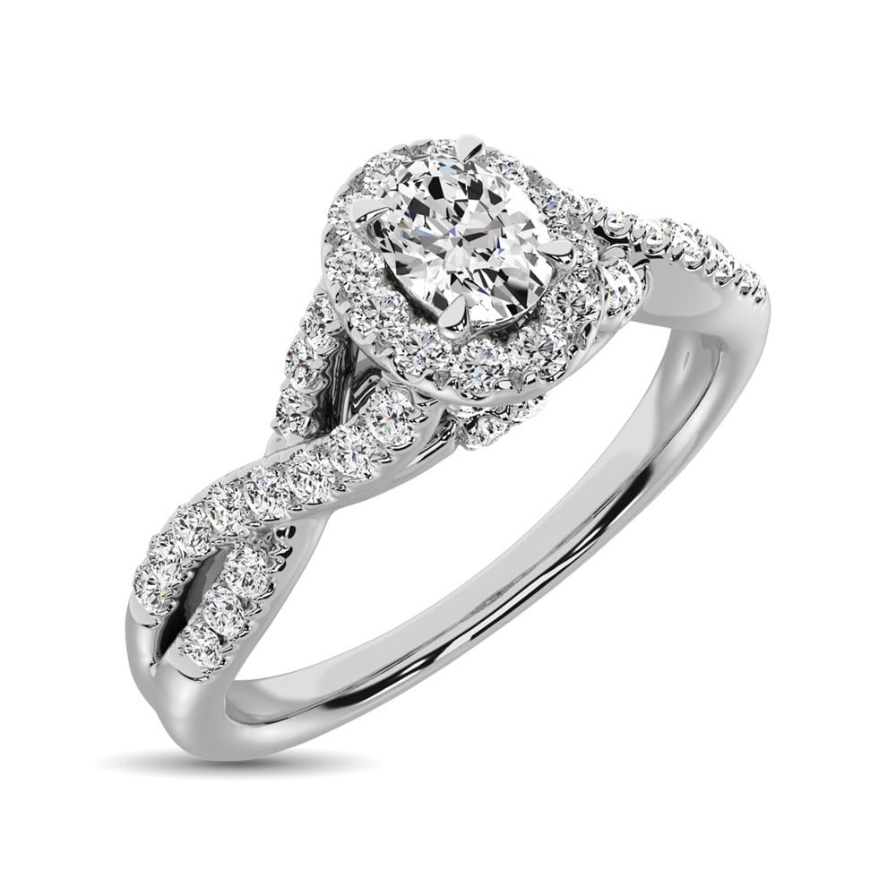 14K White Gold 1/2 Ct.Tw. Diamond Halo Engagement Ring: 14K White Gold 1/2 Ct.Tw. Diamond Halo Engagement Ring This amazing Halo Engagement Ring is available in 14K White Gold. There are 53 round diamonds with a total carat weight of 1/2 Ct.Tw. set in a mi