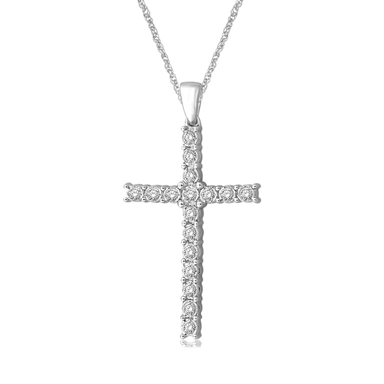 10K White Gold 1/5 Ct.Tw. Diamond Cross Pendant: 10K White Gold 1/5 Ct.Tw. Diamond Cross Pendant As dazzling and brilliant as your faith, this sleek and simple cross is fashioned of 10K white gold and prong-set with sparkling round diamond accents o