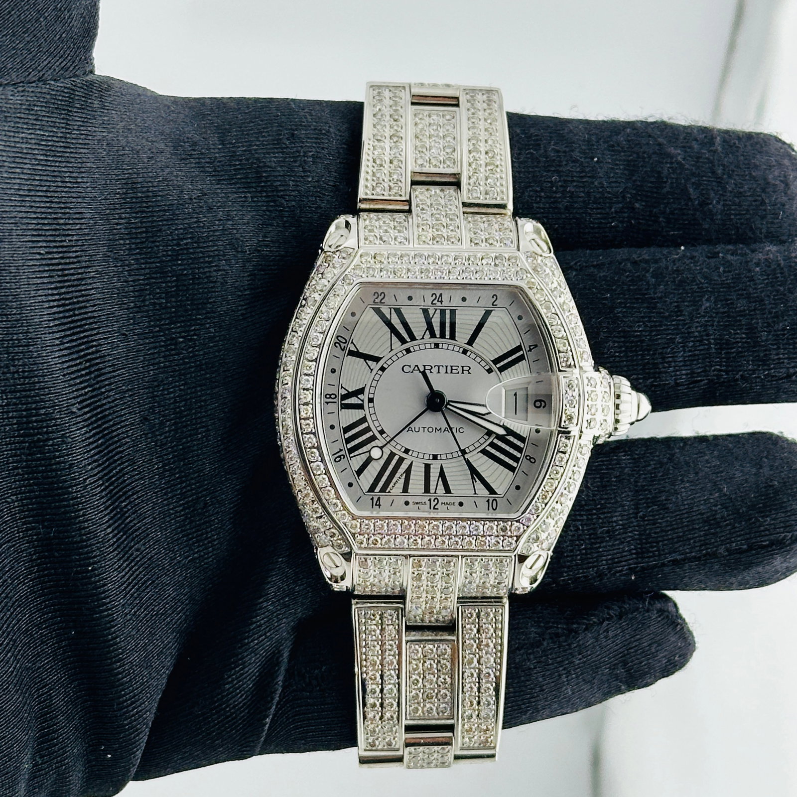 Cartier Roadster Ref 2722 Mens Watch Silver Dial Diamond Bezel and Bracelet: Cartier Roadster Ref 2722 Mens Watch Silver Dial Diamond Bezel and Bracelet This Cartier Roadster wristwatch features a striking silver dial complemented by a diamond-set bezel and bracelet. Designed