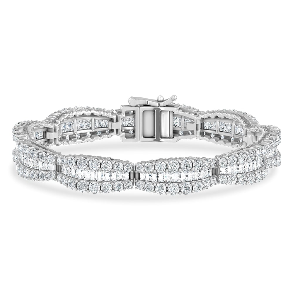 14K White Gold Lab Grown Diamond 10 Ct.Tw. Round and Baguette Fancy Bracelet: 14K White Gold Lab Grown Diamond 10 Ct.Tw. Round and Baguette Fancy Bracelet Crafted in 14K White Gold, this fancy bracelet showcases round and baguette lab grown diamonds totaling 10 Ct.Tw., radiatin