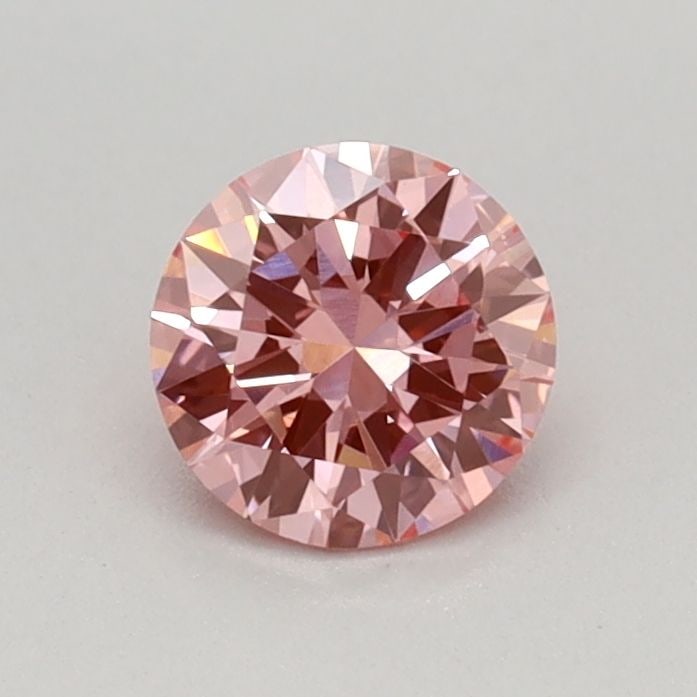 Loose Diamond - ROUND 0.4ct Fancy Vivid Pink VVS2: Loose Diamond - ROUND 0.4ct Fancy Vivid Pink VVS2 Source: This is a real non-mined Diamond that has been grown in a lab Shape: ROUND Carats: 0.4 Color: Fancy Vivid Pink Certification: IGI Video: