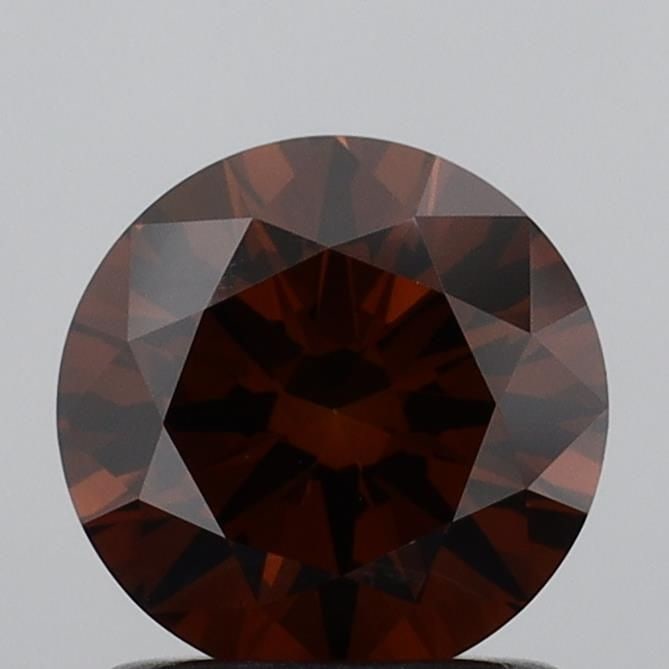 Loose Diamond - ROUND 1.07ct Fancy Deep Orange VVS2: Loose Diamond - ROUND 1.07ct Fancy Deep Orange VVS2 Source: This is a real non-mined Diamond that has been grown in a lab Shape: ROUND Carats: 1.07 Color: Fancy Deep Orange Certification: IGI Video: