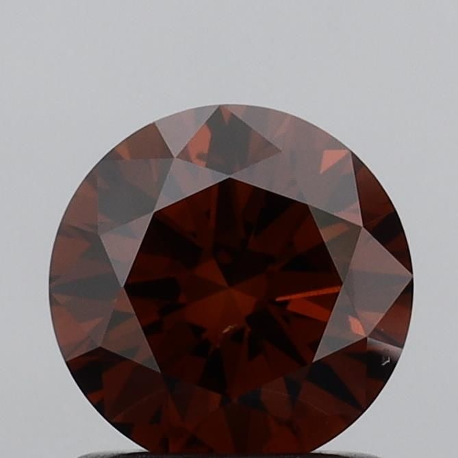 Ideal Loose Diamond - ROUND 1.01ct Fancy Deep Orangey Brown SI1: Ideal Loose Diamond - ROUND 1.01ct Fancy Deep Orangey Brown SI1 Source: This is a real non-mined Diamond that has been grown in a lab Shape: ROUND Carats: 1.01 Color: Fancy Deep Orangey Brown Certific