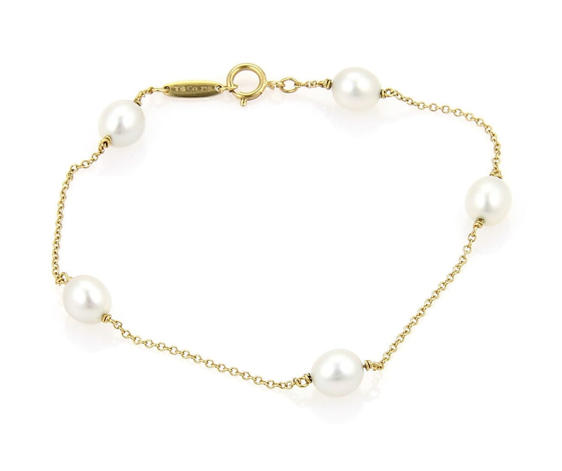 Elsa Peretti Pearls by the Yard 18k Gold Beaded Bracelet with Pearls: Elsa Peretti Pearls by the Yard 18k Gold Beaded Bracelet with Pearls This Tiffany & Co. Peretti Pearls By The Yard bracelet is crafted from 18k yellow gold and features a series of lustrous pearls in