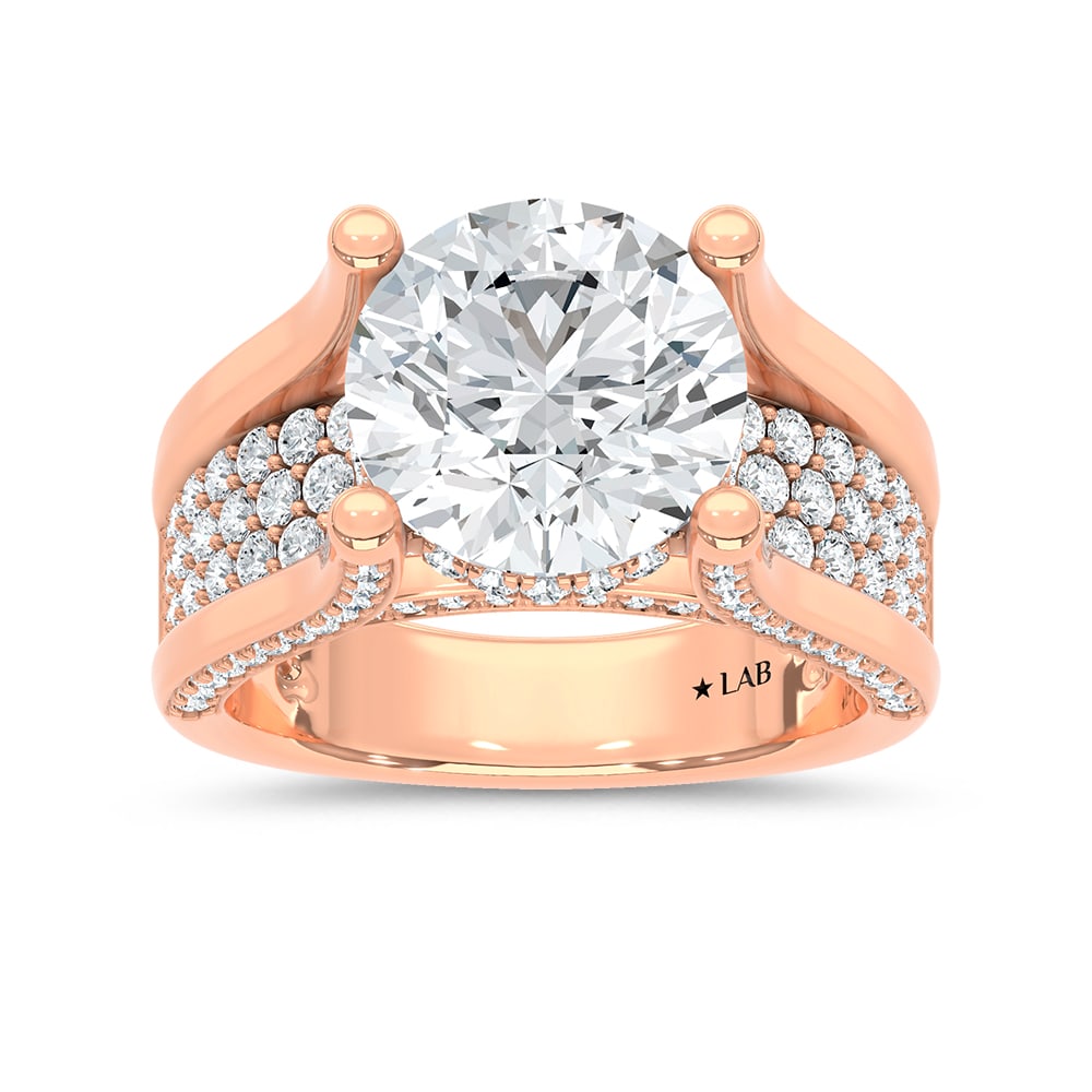 14K Rose Gold 6 1/4 Ct.Tw. Lab Grown Diamond Classic Engagement Ring (IGI Certified Center 5ct: 14K Rose Gold 6 1/4 Ct.Tw. Lab Grown Diamond Classic Engagement Ring (IGI Certified Center 5ct Round) Make a breathtaking statement with this 14K Rose gold classic engagement ring, featuring a 5-carat