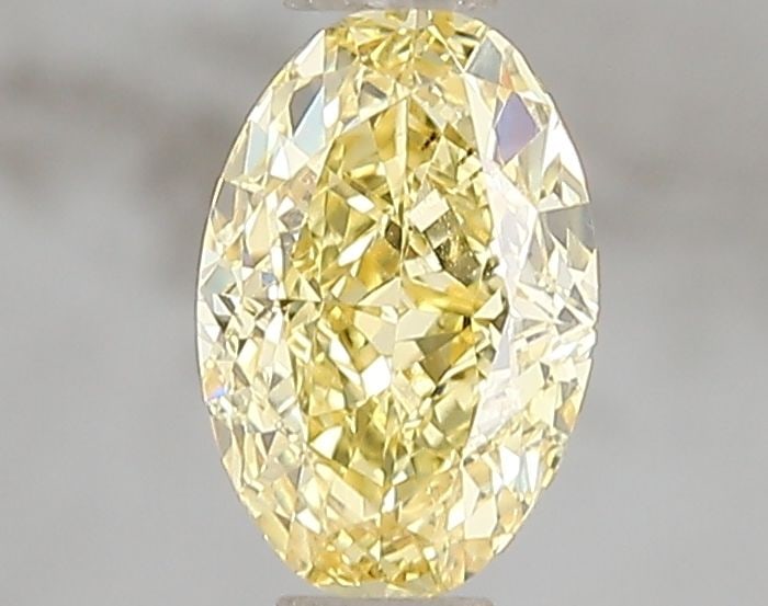 Loose Diamond - OVAL 1.02ct Fancy Vivid Yellow VS2: Loose Diamond - OVAL 1.02ct Fancy Vivid Yellow VS2 Source: This is a real non-mined Diamond that has been grown in a lab Shape: OVAL Carats: 1.02 Color: Fancy Vivid Yellow Certification: IGI Video:
