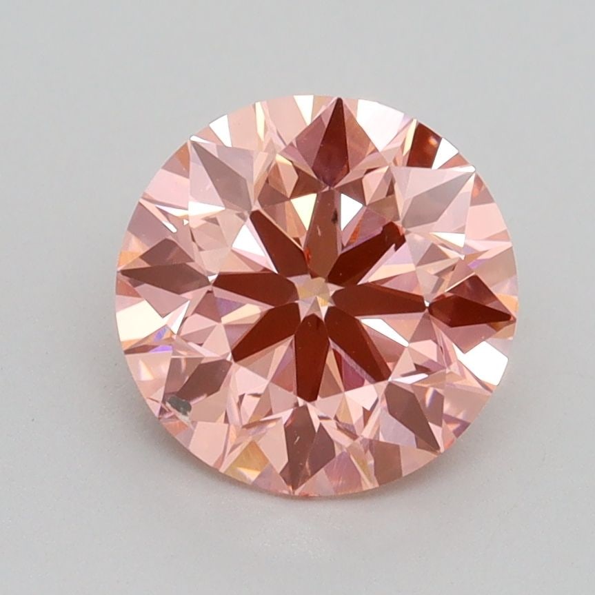 Loose Diamond - ROUND 1.83ct Fancy Vivid Pink SI1: Loose Diamond - ROUND 1.83ct Fancy Vivid Pink SI1 Source: This is a real non-mined Diamond that has been grown in a lab Shape: ROUND Carats: 1.83 Color: Fancy Vivid Pink Certification: IGI Video: