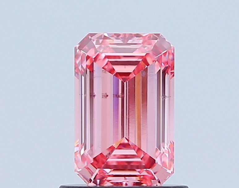 Loose Diamond - EMERALD 1.04ct Fancy Vivid Pink SI1: Loose Diamond - EMERALD 1.04ct Fancy Vivid Pink SI1 Source: This is a real non-mined Diamond that has been grown in a lab Shape: EMERALD Carats: 1.04 Color: Fancy Vivid Pink Certification: IGI Video: