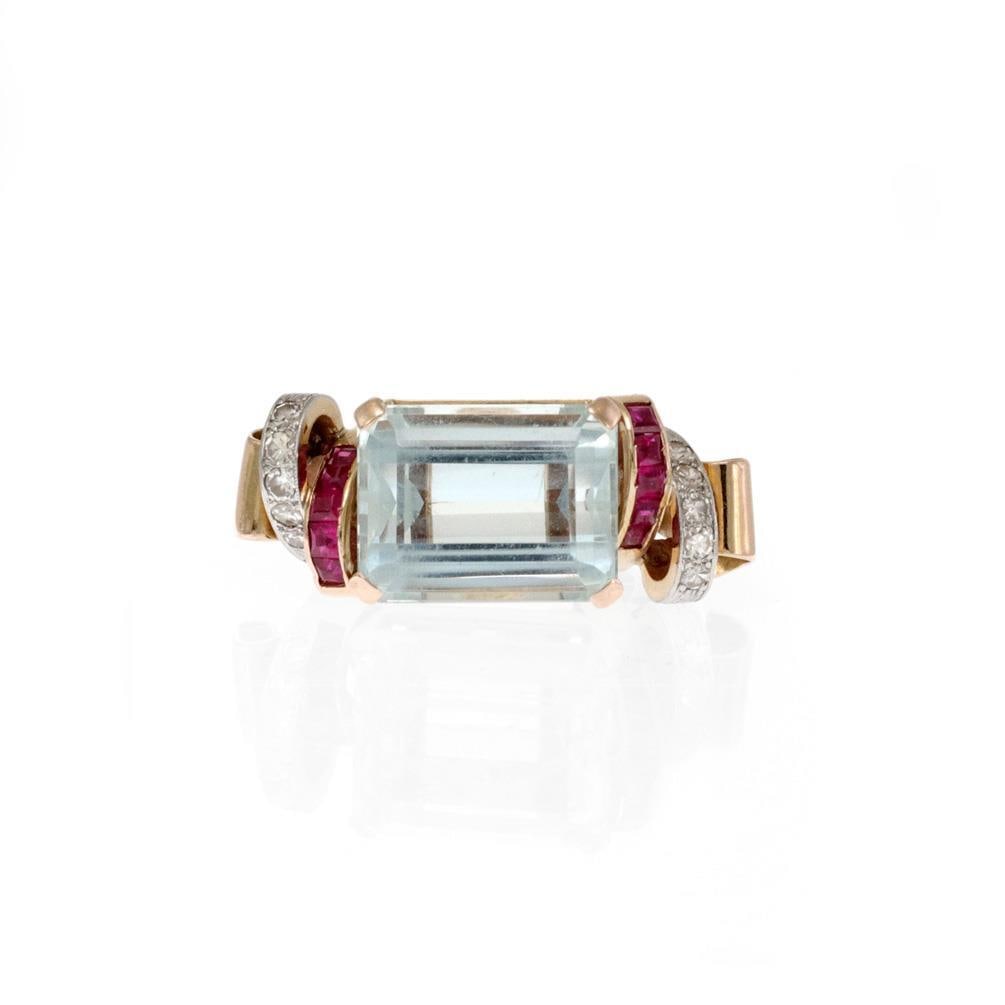 Retro 12.60ct Aquamarine Ruby Diamond 18k Rose Gold Ring: Retro 12.60ct Aquamarine Ruby Diamond 18k Rose Gold Ring This stunning Retro Era cocktail ring is a true statement piece, expertly crafted from 18k rose gold with white gold accents. The design featur