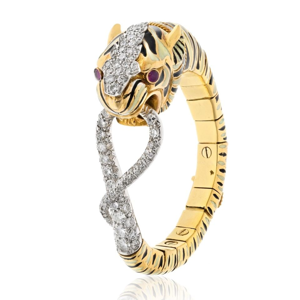 David Webb Tiger Bracelet Platinum 18K Gold Ruby Eyes Diamond Collar: David Webb Tiger Bracelet Platinum 18K Gold Ruby Eyes Diamond Collar This stunning David Webb bracelet showcases a captivating tiger design, featuring striking black and white enamel stripes and vibra