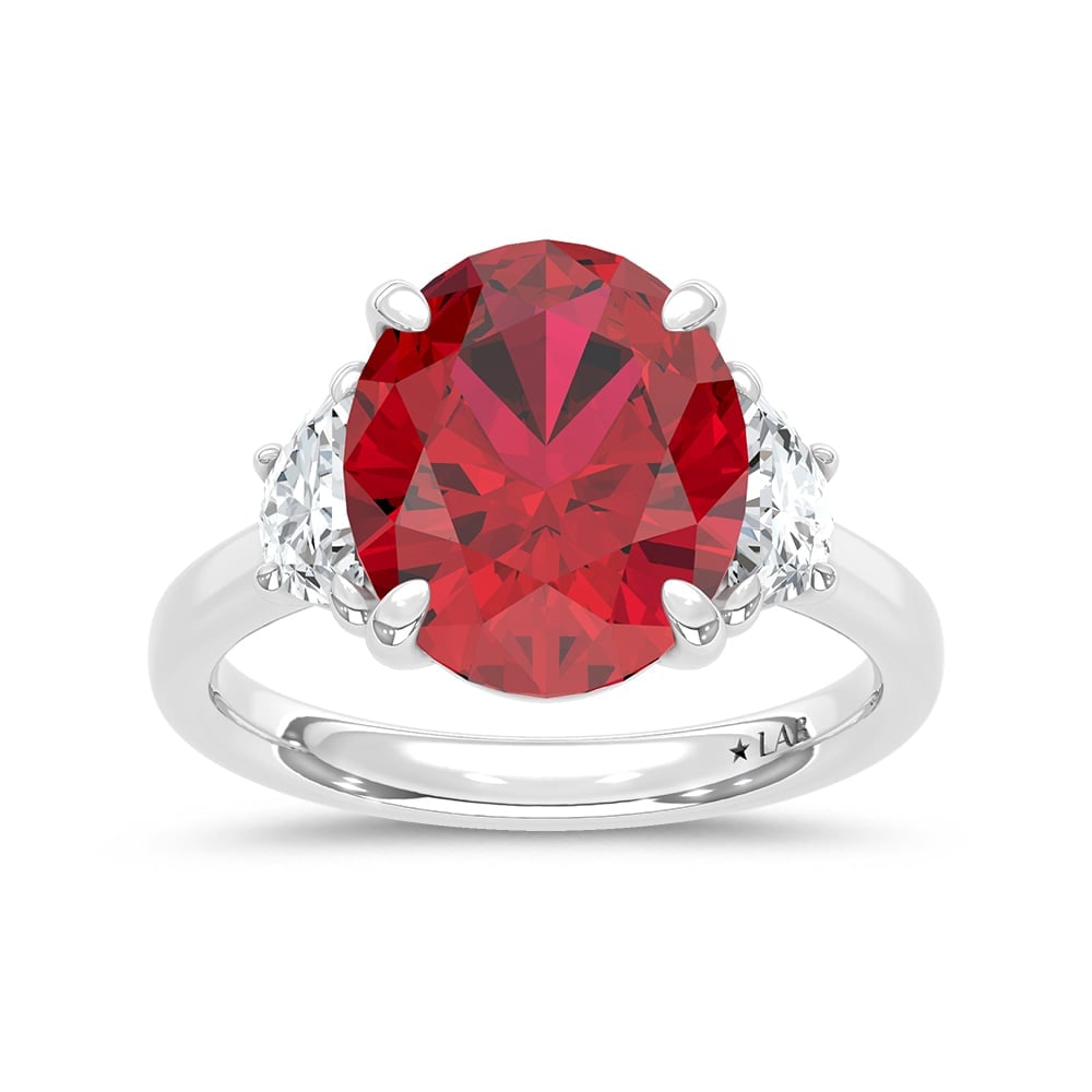 14K White Gold Lab Grown Diamond 7 1/5 Ct.Tw. Oval Shape Recrystalized Ruby Engagement Ring (Center: 14K White Gold Lab Grown Diamond 7 1/5 Ct.Tw. Oval Shape Recrystalized Ruby Engagement Ring (Center 6 5/8 ct) Exude timeless elegance with this 14K white gold engagement ring. Its centerpiece is a mag