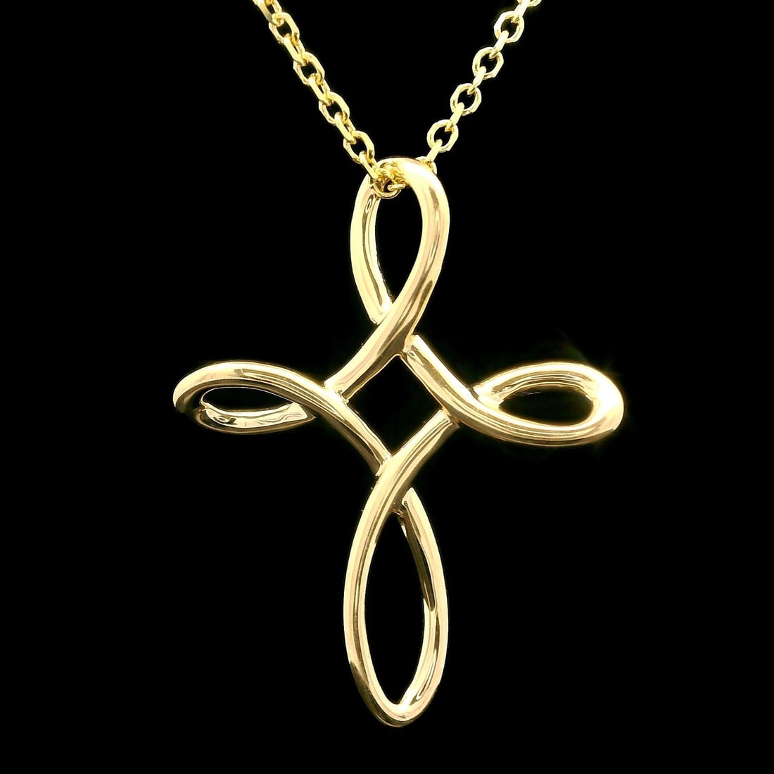 14k Yellow Gold Infinity Cross Slide Pendant with 18" Cable Link Chain: 14k Yellow Gold Infinity Cross Slide Pendant with 18" Cable Link Chain This exquisite 14k Yellow Gold Wire Open Work Infinity Cross Slide Pendant features a beautifully crafted design that symbolizes