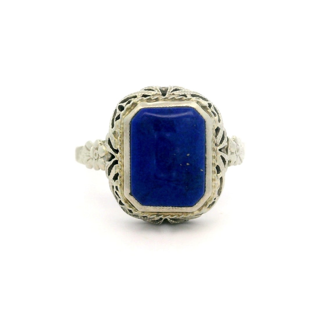 Antique Art Deco 14K White Gold Lapis Lazuli Solitaire Ring: Antique Art Deco 14K White Gold Lapis Lazuli Solitaire Ring This exquisite Antique Art Deco ring showcases a stunning natural lapis lazuli stone, featuring a rectangular cut and a deep blue hue. The s