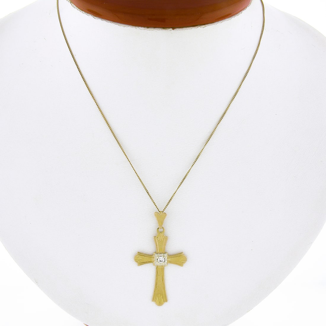Vintage 18K Two Tone Gold Diamond Cross Pendant Necklace with Curb Link Chain: Vintage 18K Two Tone Gold Diamond Cross Pendant Necklace with Curb Link Chain This exquisite vintage cross pendant is crafted from solid 18K two-tone gold, featuring a beautifully etched design and a
