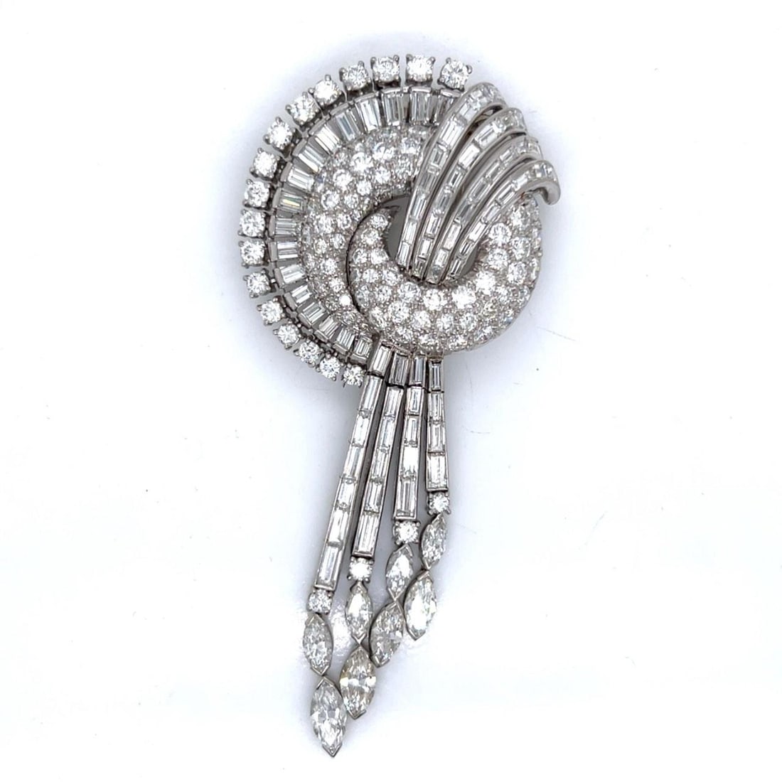 Art Deco Platinum Brooch 27.70 Ct Diamonds E-G Color VVS-VS Clarity: Art Deco Platinum Brooch 27.70 Ct Diamonds E-G Color VVS-VS Clarity This stunning Art Deco brooch is crafted in platinum and features an impressive total diamond weight of 27.70 ct. It showcases 8 mar