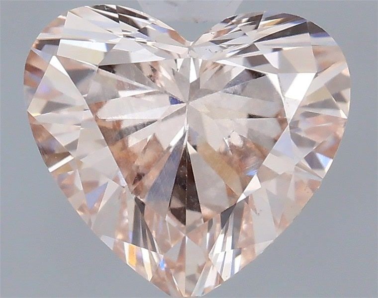 Loose Diamond - HEART 0.63ct Fancy Light Brown Pink VS1: Loose Diamond - HEART 0.63ct Fancy Light Brown Pink VS1 Source: This is a real non-mined Diamond that has been grown in a lab Shape: HEART Carats: 0.63 Color: Fancy Light Brown Pink Certification: IGI