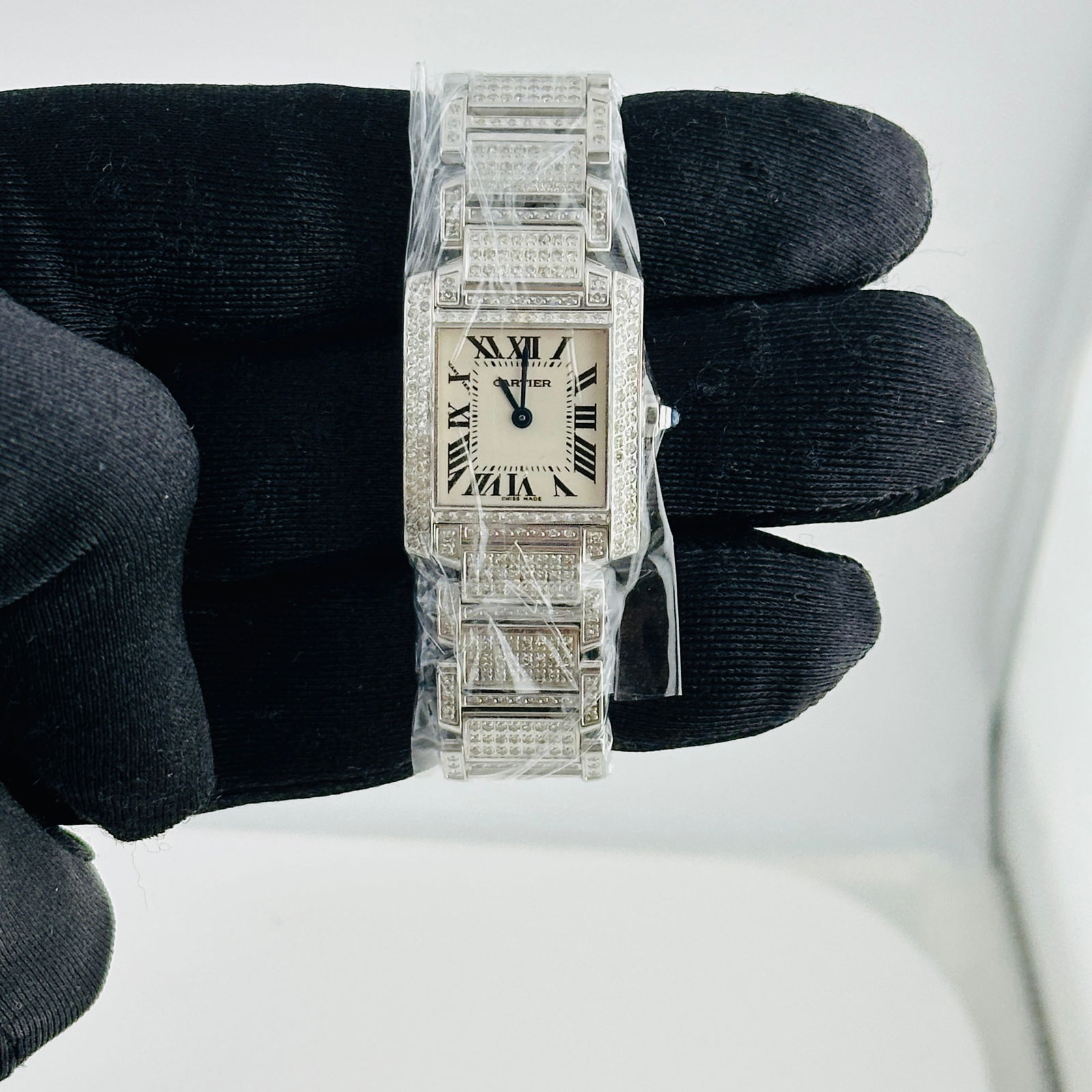 Tank Francaise Ref 2384 Ladies Watch with Diamond Bezel and Bracelet White Dial: Tank Francaise Ref 2384 Ladies Watch with Diamond Bezel and Bracelet White Dial This Cartier Tank Francaise watch features a white dial and is accented with diamonds on both the bezel and bracelet. De