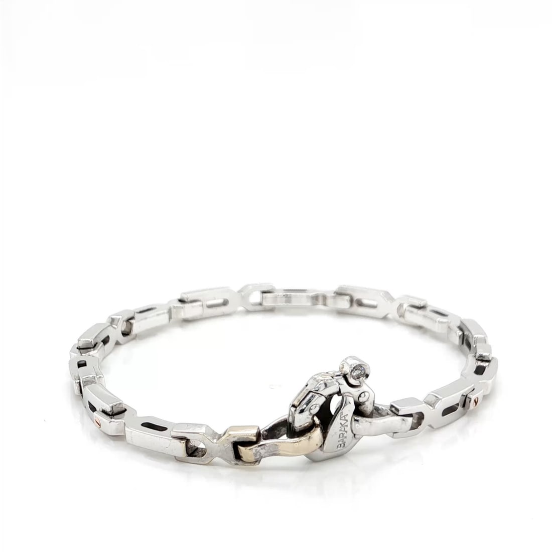 Baraka 18k White and Rose Gold 7 Inch Fancy Link Chain Bracelet: Baraka 18k White and Rose Gold 7 Inch Fancy Link Chain Bracelet This Baraka bracelet is crafted from 18k white and rose gold in a distinctive fancy link chain design. The bracelet is hallmarked and si