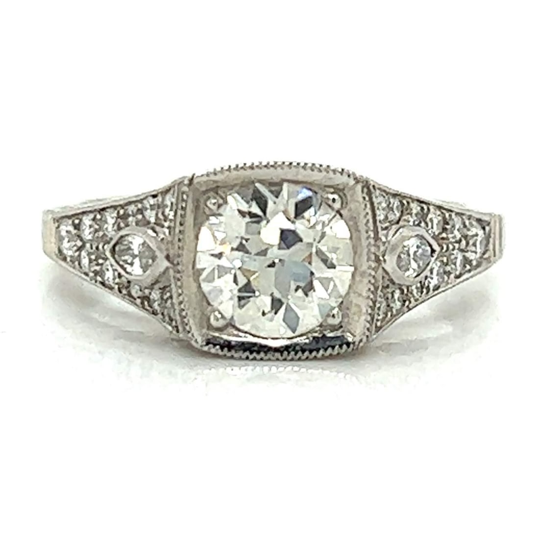 Elegant Platinum Ring with 0.99 Ct I Color VS1 Diamond: Elegant Platinum Ring with 0.99 Ct I Color VS1 Diamond This stunning platinum ring features a dazzling center diamond weighing 0.99 Ct. with I color and VS1 clarity, ensuring exceptional brilliance. T