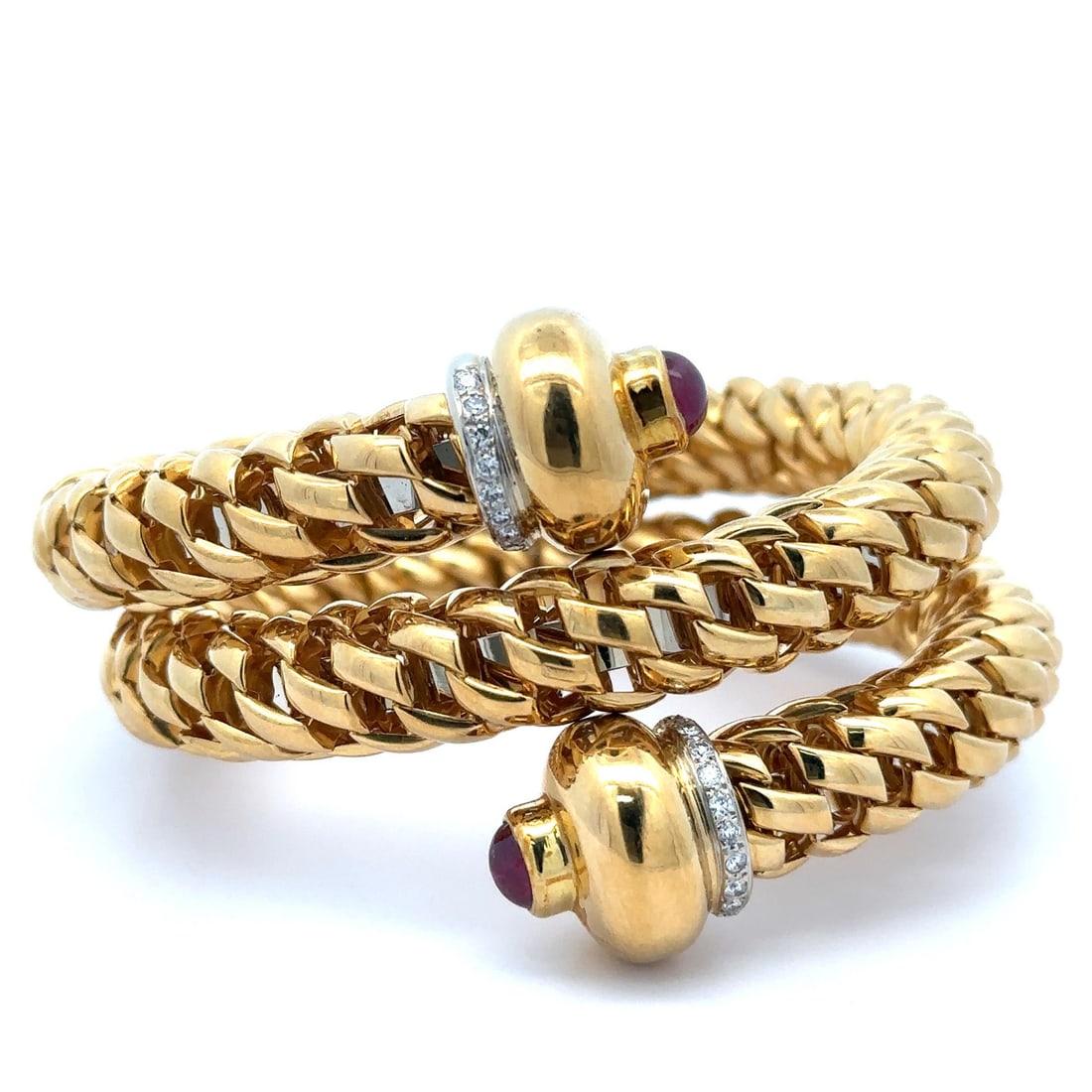 Vintage Fope 18k Gold Diamond Ruby Snake Wrap Bracelet: Vintage Fope 18k Gold Diamond Ruby Snake Wrap Bracelet This vintage FOPE bracelet is a stunning piece of jewelry crafted from solid 18k yellow gold, accentuated with white gold details. The design fea
