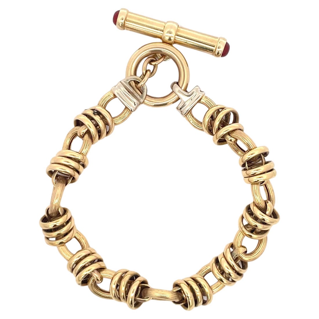 Harbor Diamonds 14K Yellow Gold Toggle Link Bracelet with Ruby Clasp: Harbor Diamonds 14K Yellow Gold Toggle Link Bracelet with Ruby Clasp This stunning toggle link bracelet features a contemporary design crafted from 14 karat yellow gold and adorned with a round cut ru