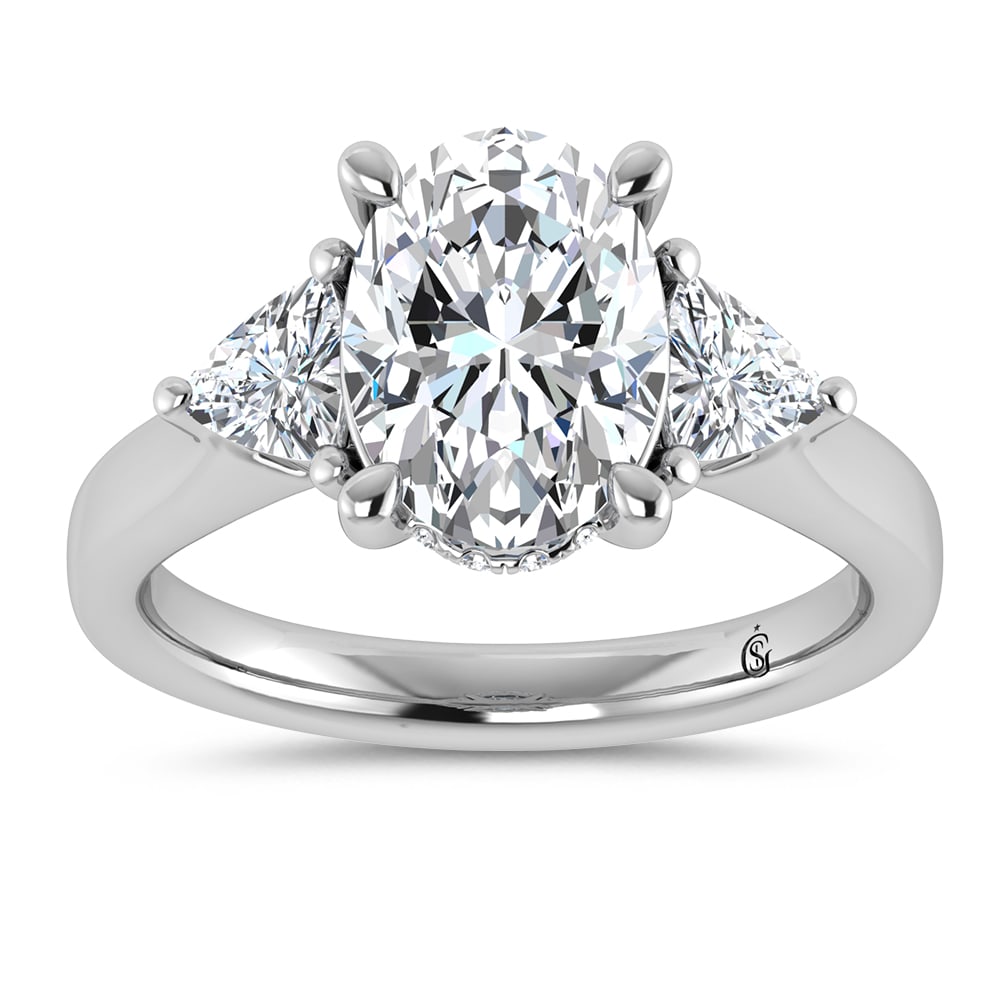 14K White Gold Lab Grown Diamond 3 5/8 Ct.Tw. Engagement Ring: 14K White Gold Lab Grown Diamond 3 5/8 Ct.Tw. Engagement Ring This stunning three-stone ring features a sparkling 3 CT Oval Center diamond with two shimmering side diamonds, symbolizing past, present,