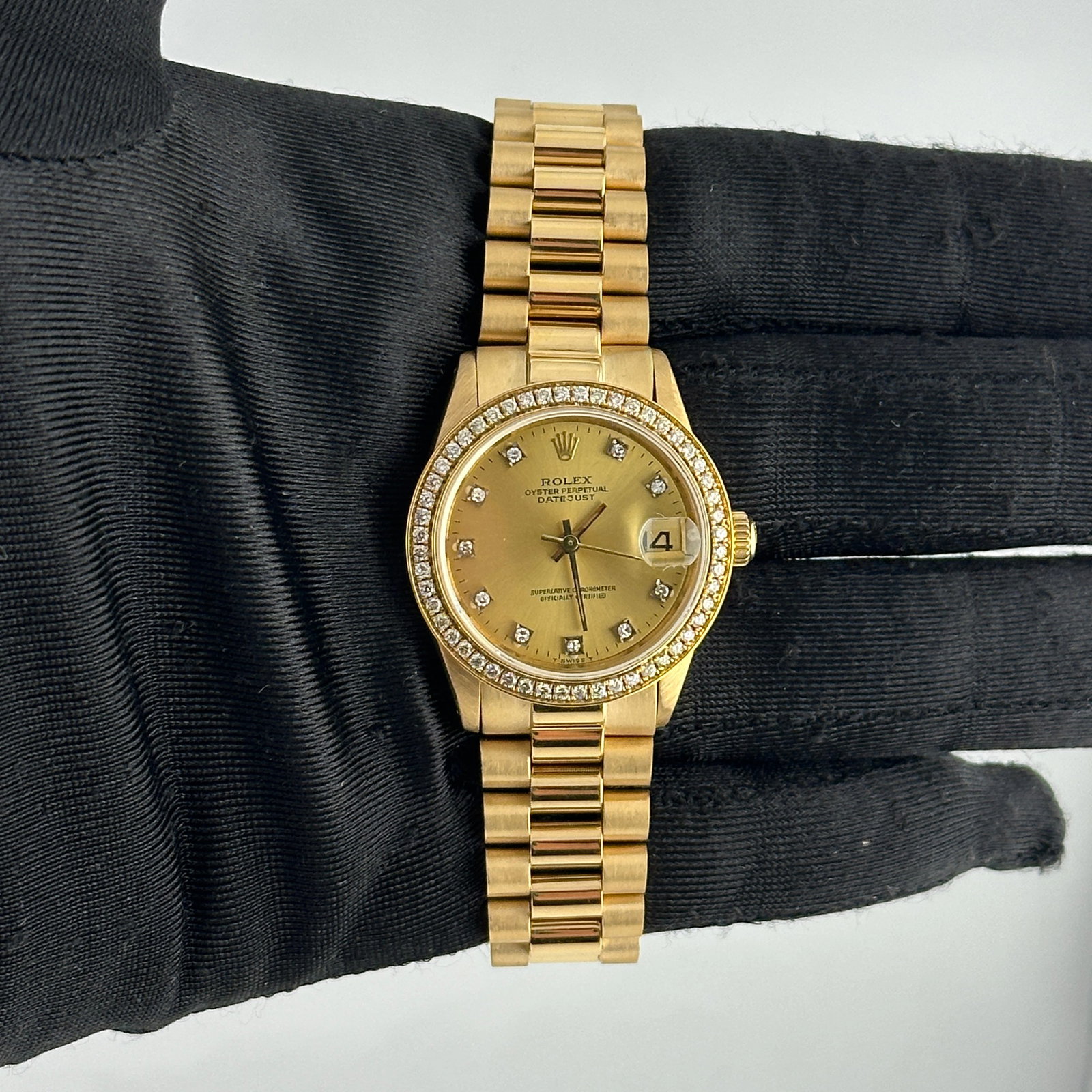 Rolex Datejust Ref 6827 Ladies Watch Champagne Diamond Dial Aftermarket Presi 18K Bracelet: Rolex Datejust Ref 6827 Ladies Watch Champagne Diamond Dial Aftermarket Presi 18K Bracelet This ladies' Rolex Datejust features a champagne diamond factory dial, complemented by a pave plated diamond