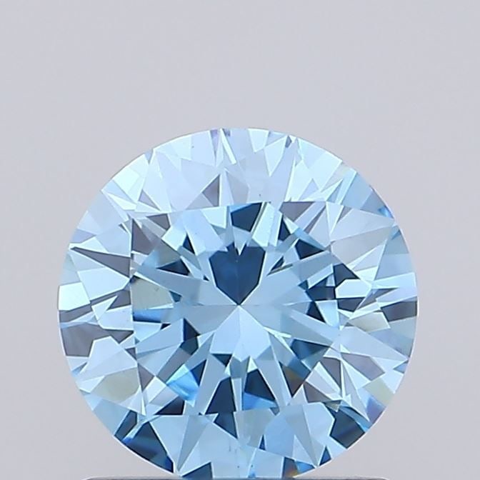 Loose Diamond - ROUND 0.97ct Fancy Vivid Blue VVS2: Loose Diamond - ROUND 0.97ct Fancy Vivid Blue VVS2 Source: This is a real non-mined Diamond that has been grown in a lab Shape: ROUND Carats: 0.97 Color: Fancy Vivid Blue Certification: IGI Video: