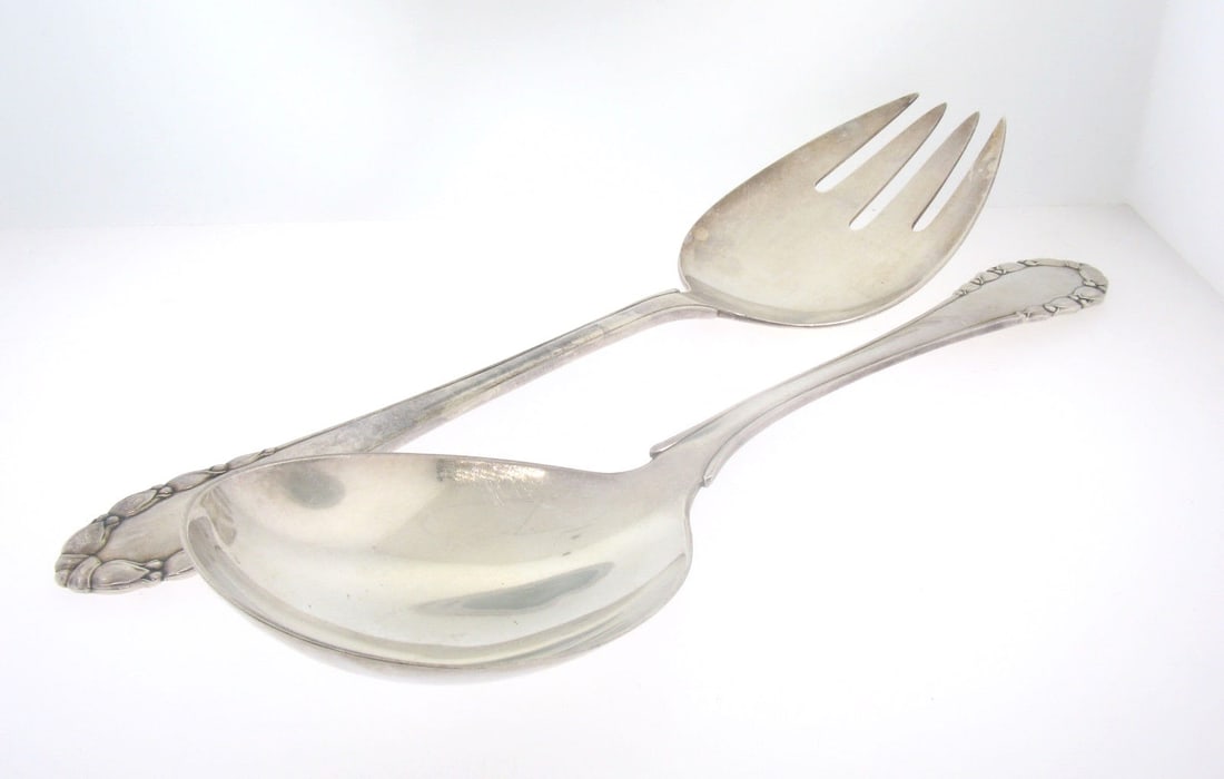 Georg Jensen Sterling Silver Lily of the Valley Serving Spoon and Fork Set: Georg Jensen Sterling Silver Lily of the Valley Serving Spoon and Fork Set Enhance your dining experience with this exquisite Vintage Georg Jensen Sterling Silver "Lily of the Valley" Serving Spoon an