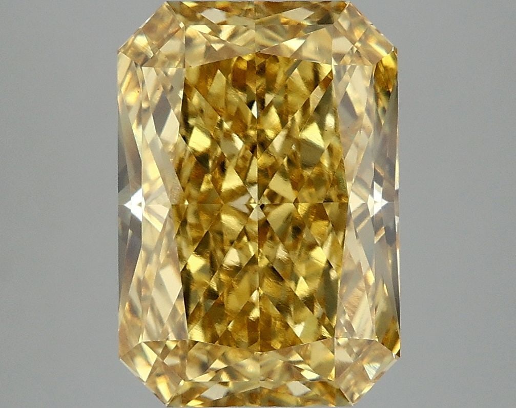 Loose Diamond - RADIANT 5.1ct Fancy Vivid Yellow VS1: Loose Diamond - RADIANT 5.1ct Fancy Vivid Yellow VS1 Source: This is a real non-mined Diamond that has been grown in a lab Shape: RADIANT Carats: 5.1 Color: Fancy Vivid Yellow Certification: IGI Video