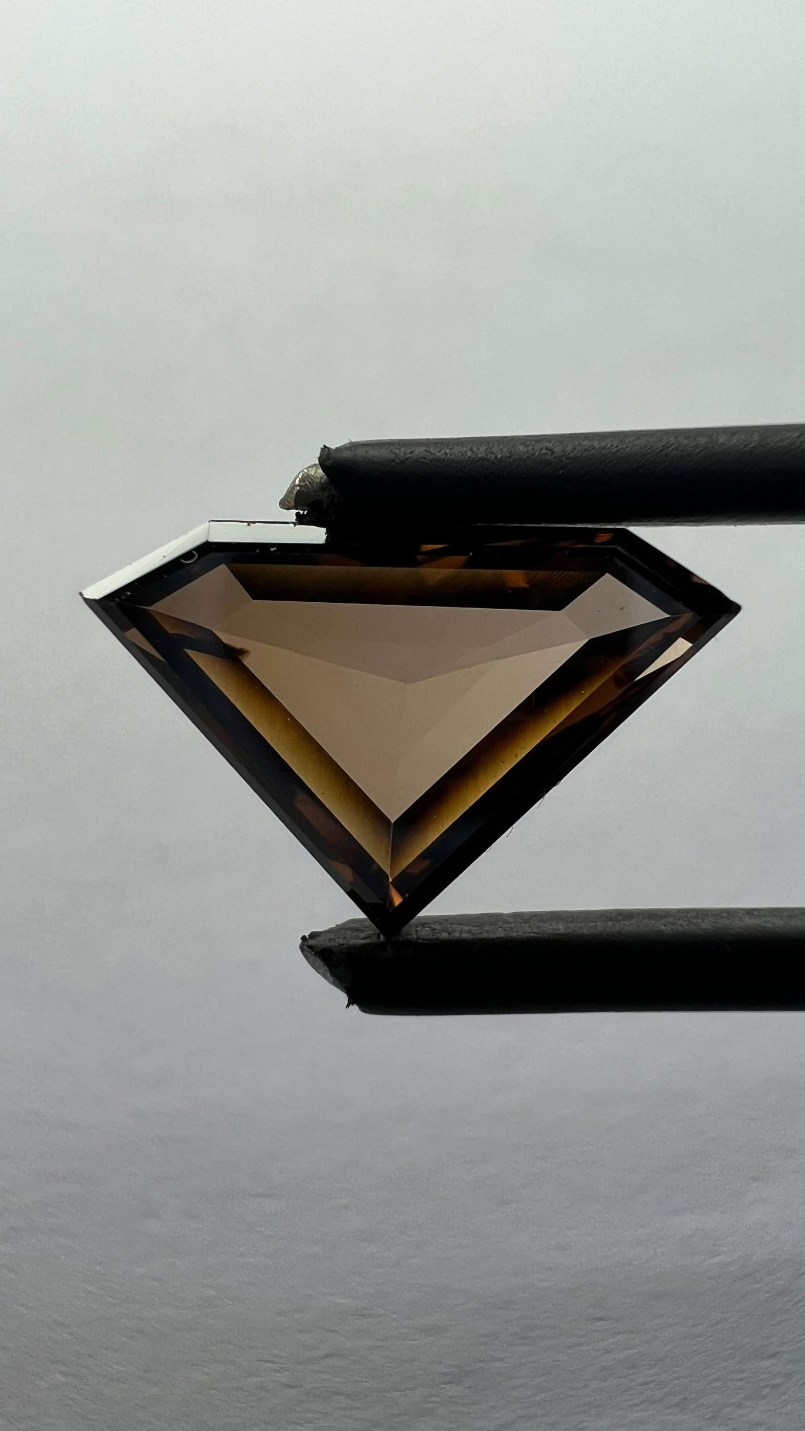 Loose Diamond - OTHER 1.63ct Brown VS1: Loose Diamond - OTHER 1.63ct Brown VS1 Source: This is a real non-mined Diamond that has been grown in a lab Shape: OTHER Carats: 1.63 Color: Brown Certification: NONE The Diamond Depot Guarantee: All