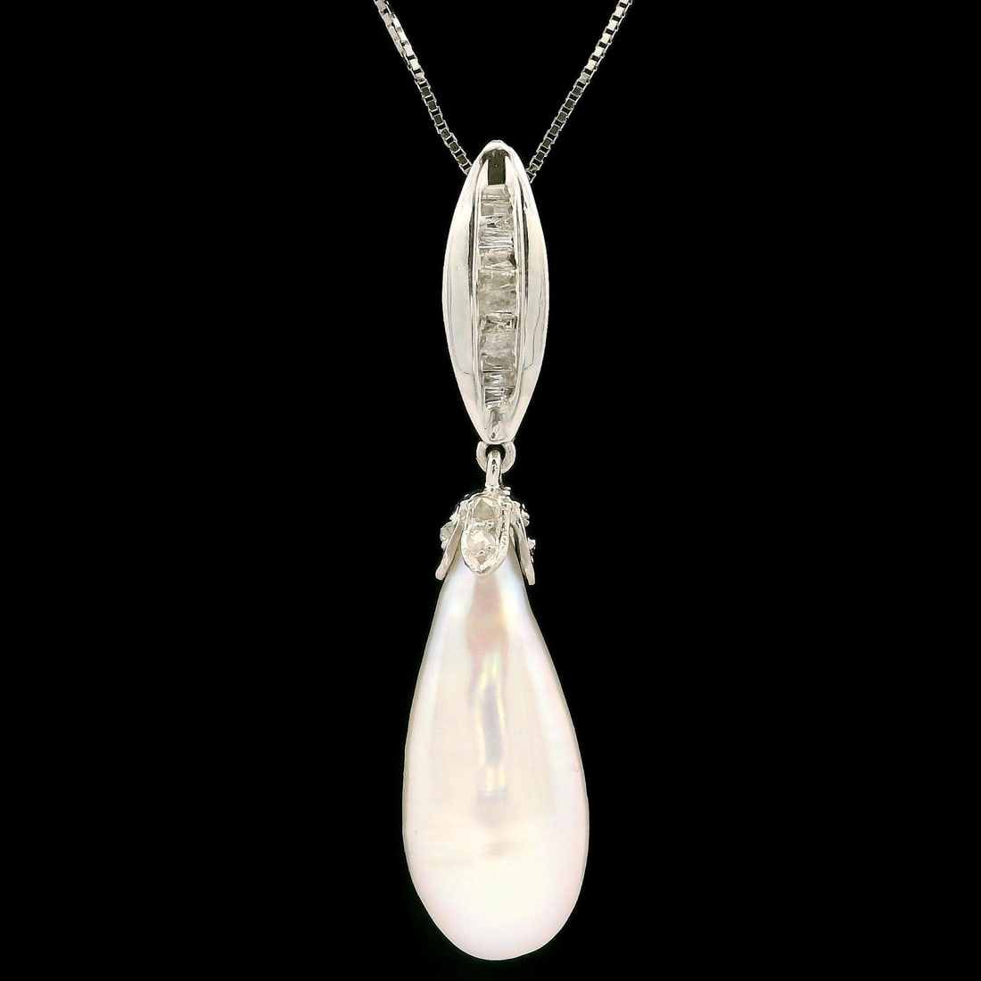 14k White Gold Tear Drop Pearl & Diamond Pendant Necklace: 14k White Gold Tear Drop Pearl & Diamond Pendant Necklace This exquisite pendant necklace showcases a stunning combination of a baroque freshwater pearl and sparkling diamonds, elegantly set in solid
