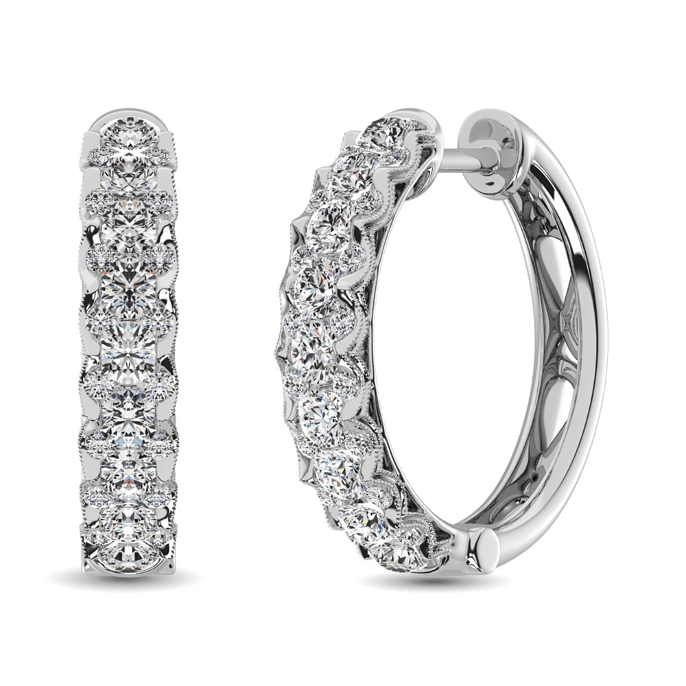 10K White Gold Diamond 1 Ct.Tw. Hoop Earrings: 10K White Gold Diamond 1 Ct.Tw. Hoop Earrings These glamorous earrings are available in 10K White Gold. There are 50 round diamonds with a total carat weight of 1.00Ct.Tw. set in a Prong/Miligrain set